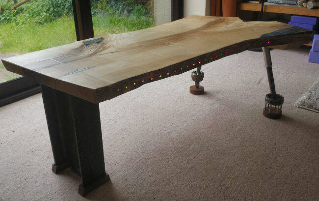 It's a pretty unique looking table, but it's hiding an awesome secret...