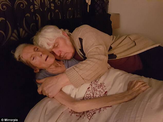 Showing her in a fragile state, she was left as just a pile of skin and bones before she eventually passed away naturally in December (pictured with her husband of 51 years, Tom, during her final weeks)