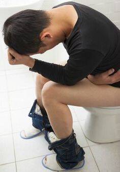 adult man with diarrhea painful sitting toilet seat
