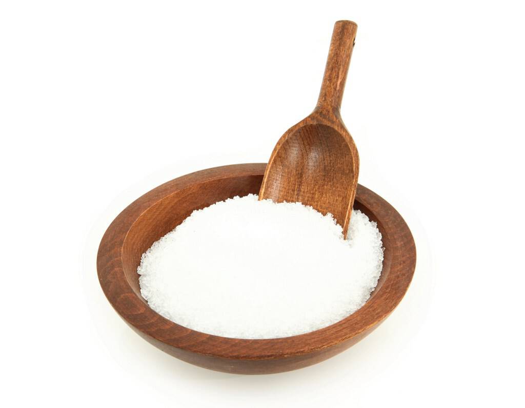 Epsom Salt In Wooden Bowl With Scoop Isolated On White Background