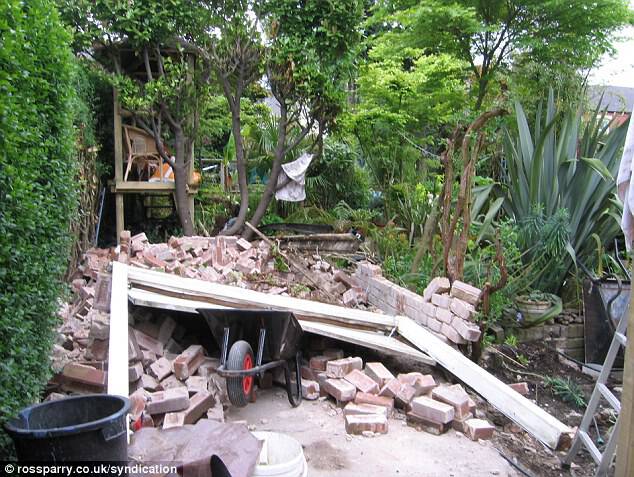 Under construction: Nick Wilson has spent years - and thousands of pounds - constructing his garden paradise