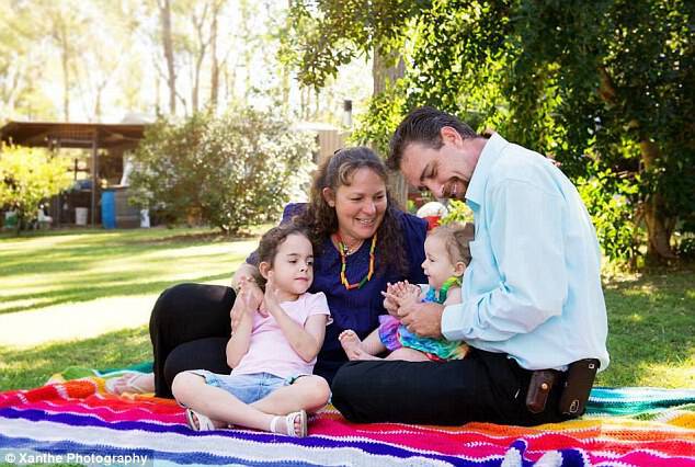 Happy family: After a whirlwind start, little Rachel has been enjoying her life like any little girl (pictured with her mother Rhonda, father Colin and younger sister Rebekkah)