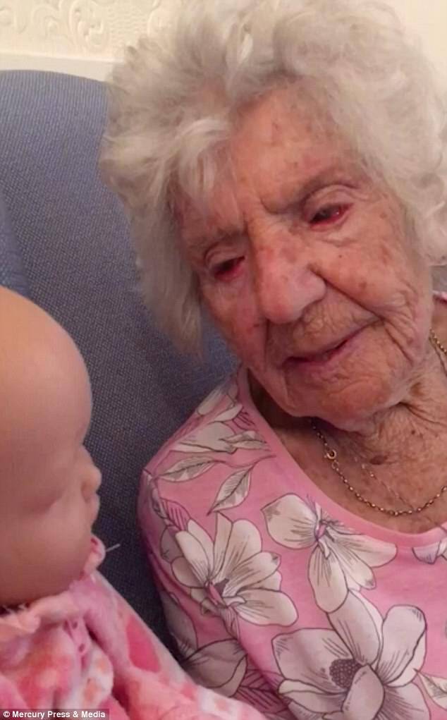 The 94-year-old likes to feed and cuddle her doll, but doesn't change her clothes 