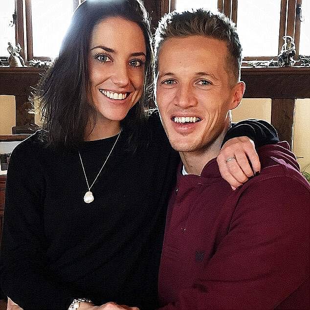 Jake Coates hopes to become a father after a childhood friend came forward and offered to carry the baby he and his late wife Emmy (pictured together) desperately wanted