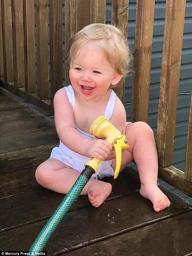 Ivy, who used to love playing with the garden hose, has since developed a fear of water 